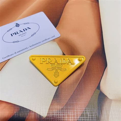 fake prada pin